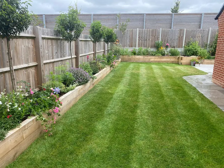 New paved patio and planted borders built in a Buckinghamshire garden